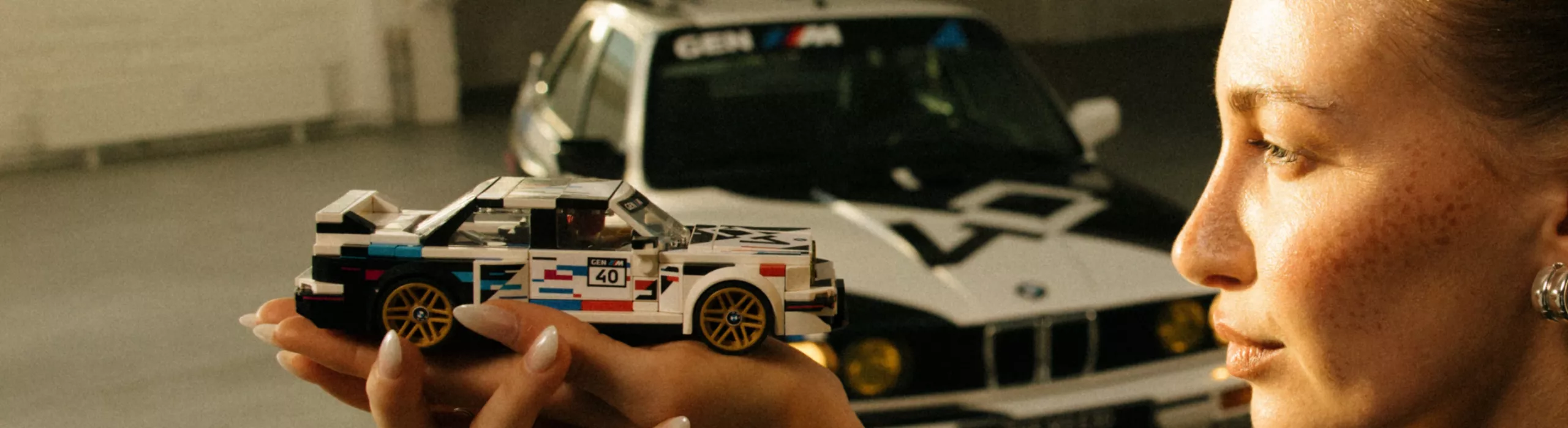 BMW Lifestyle Toys & Kids BMW Lego BMW M held in the palm of a young woman