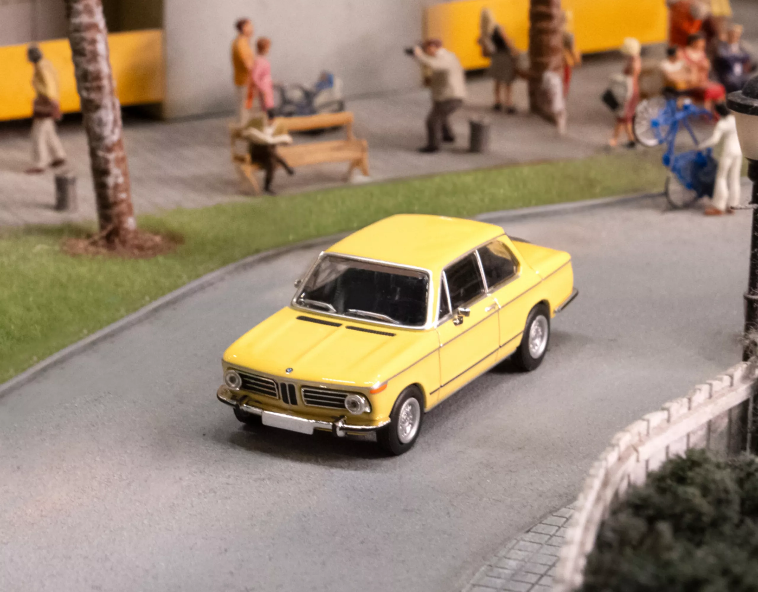 BMW Lifestyle BMW 02 miniature in yellow in a miniature setting
