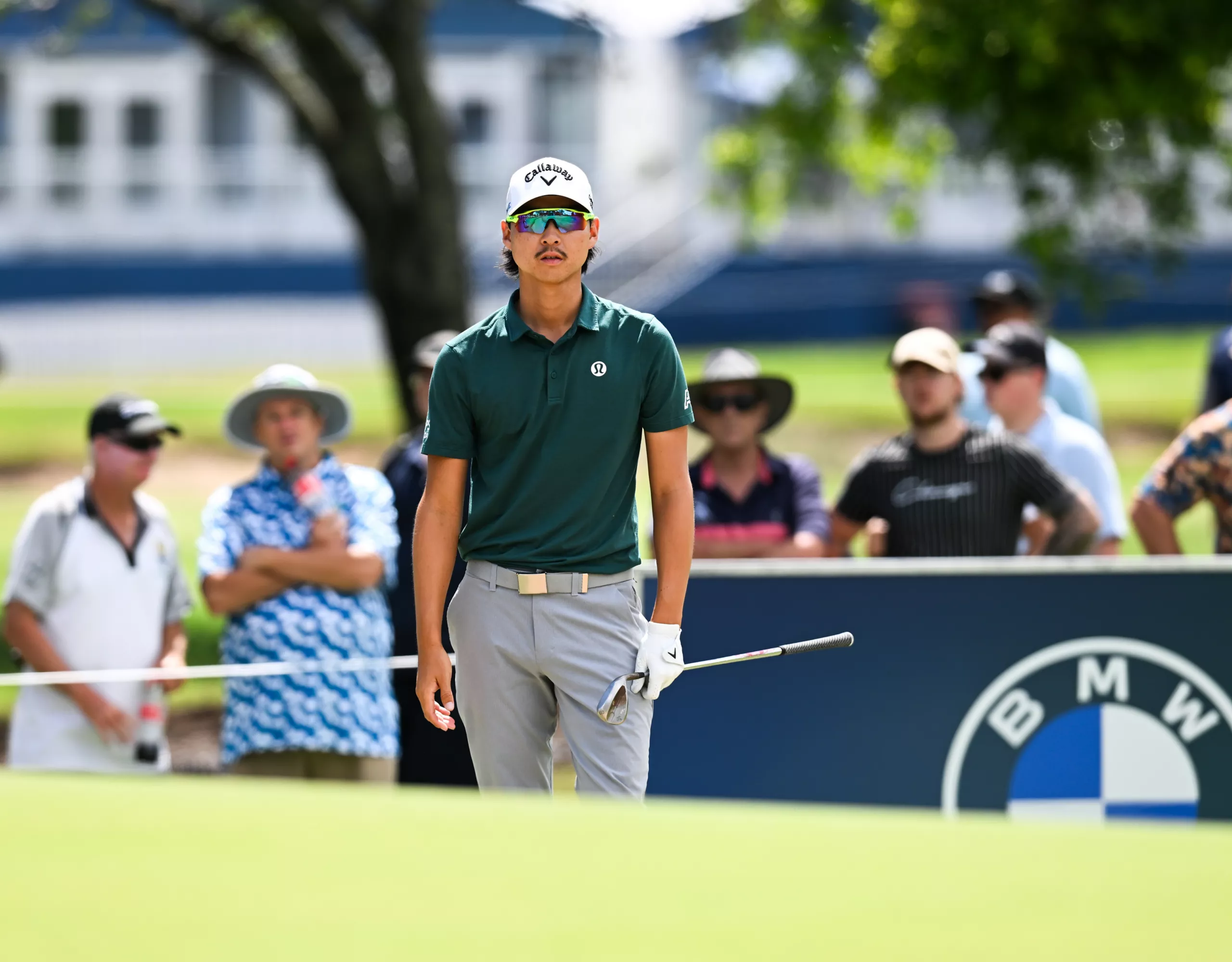 BMW Australia golf ambassador Min Woo Lee looks on during the BMW Australian PGA Championship at the Royal Queensland Golf Club.