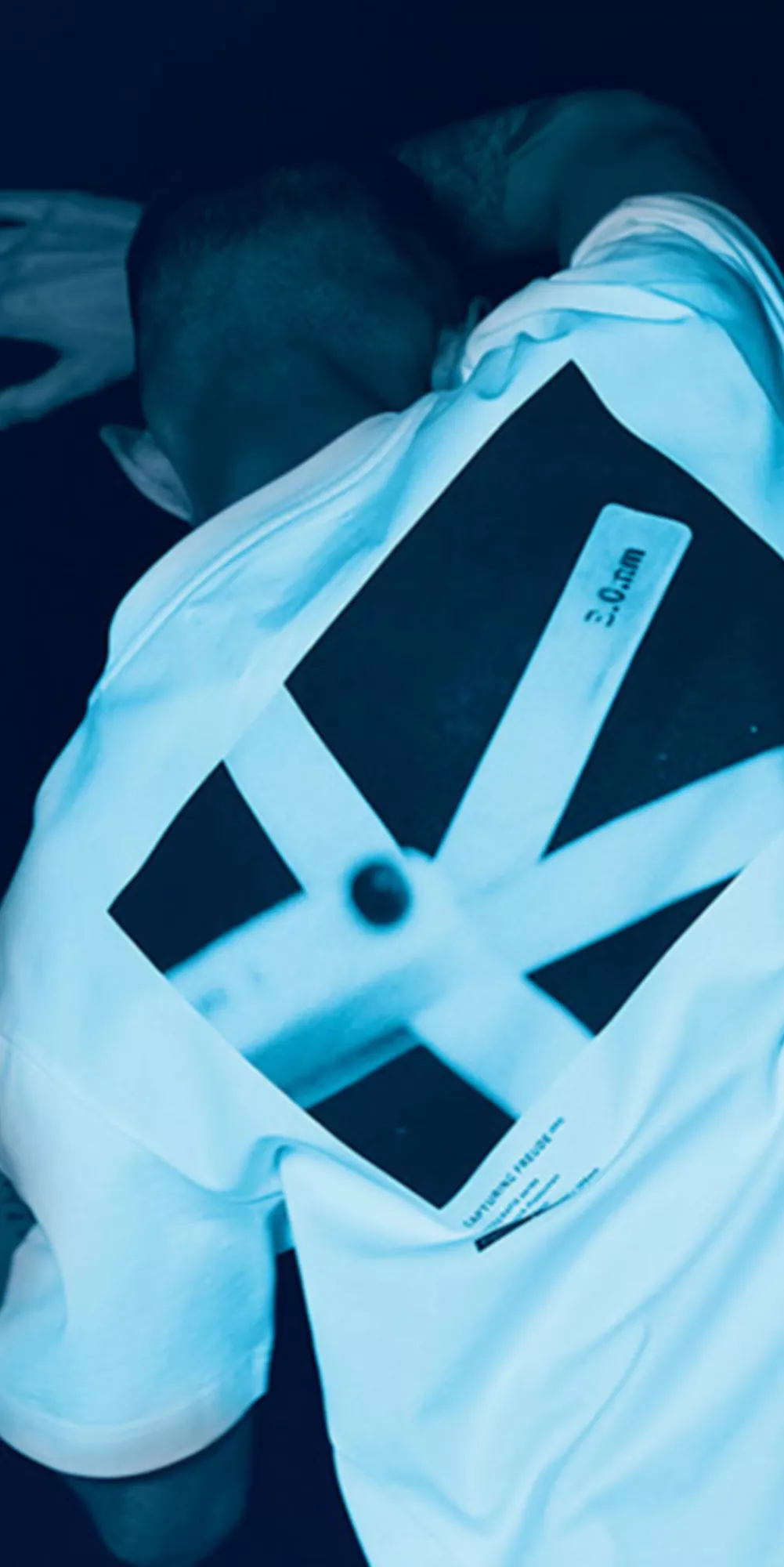 BMW Lifestyle Fragrances Amberness and Bergamood pictured in the countryside in front of two BMWs