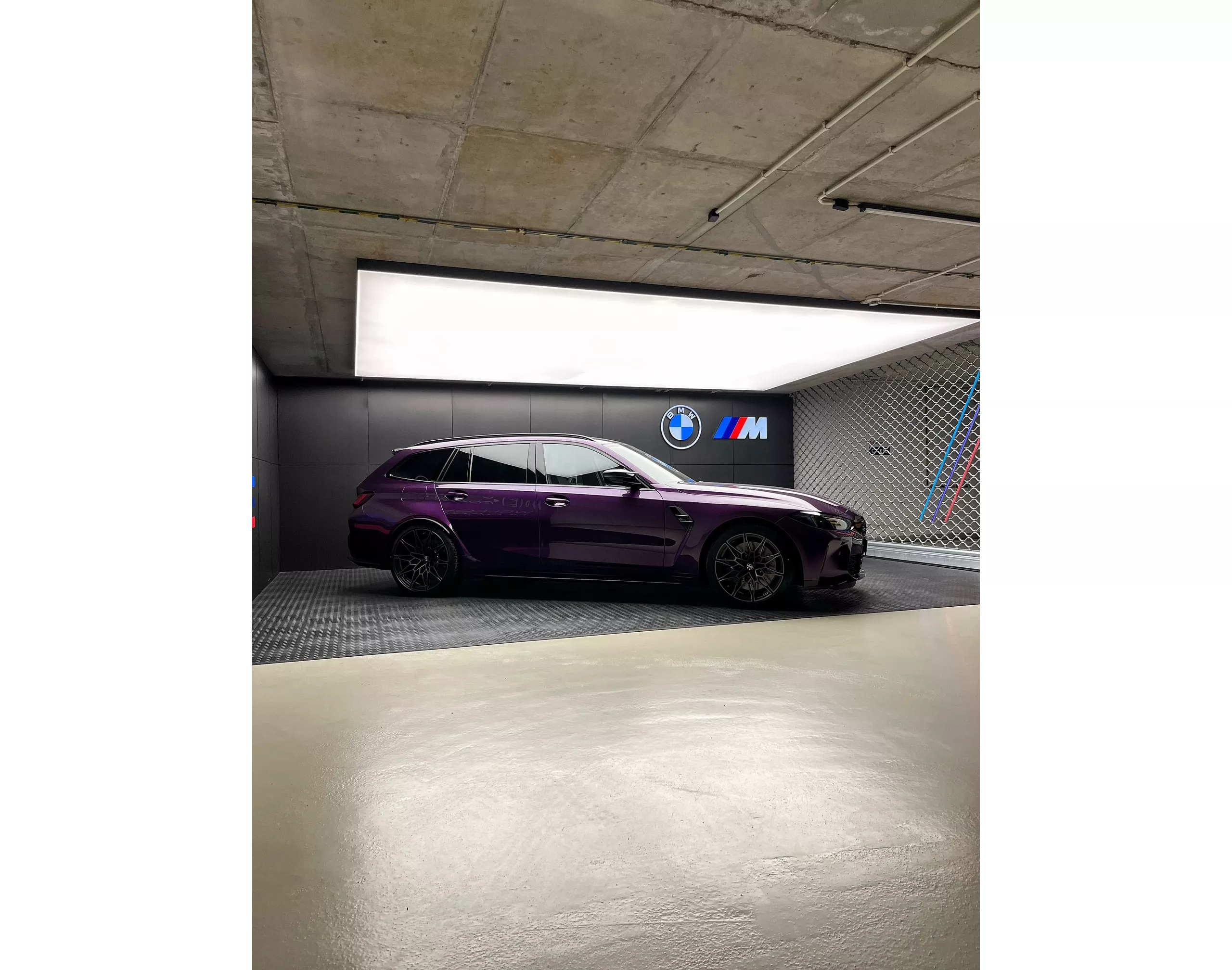 Purple BMW M Touring. 