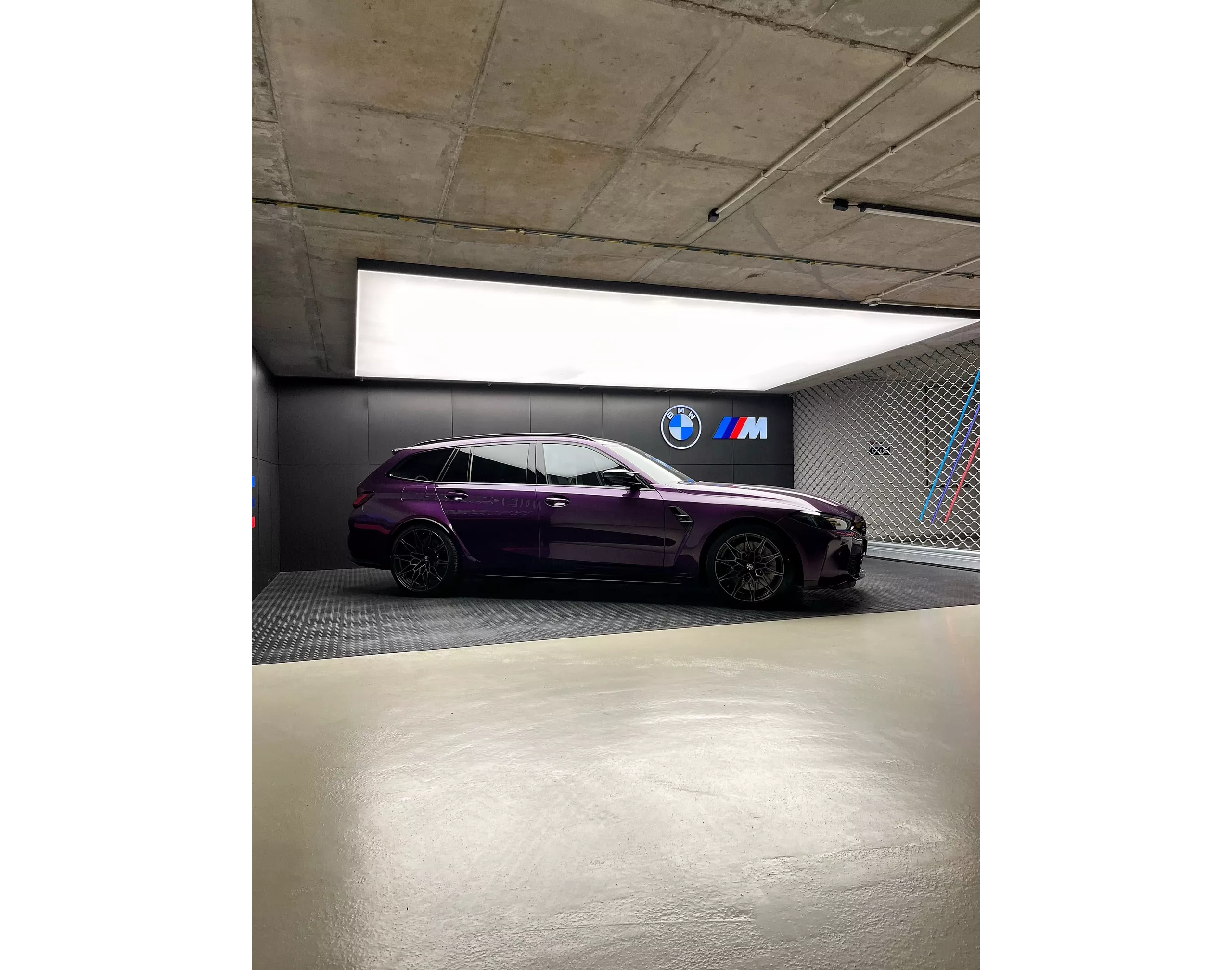 Purple BMW M Touring. 