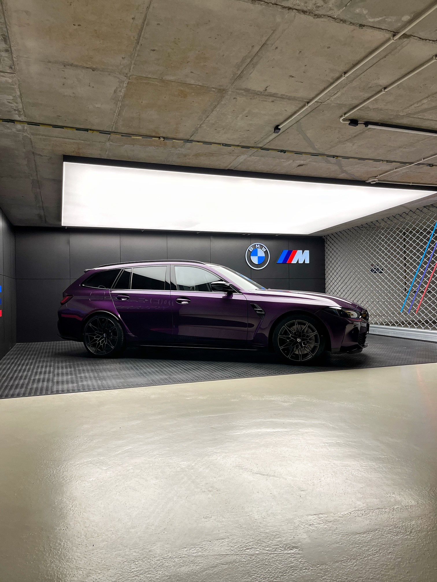 Purple BMW M Touring. 