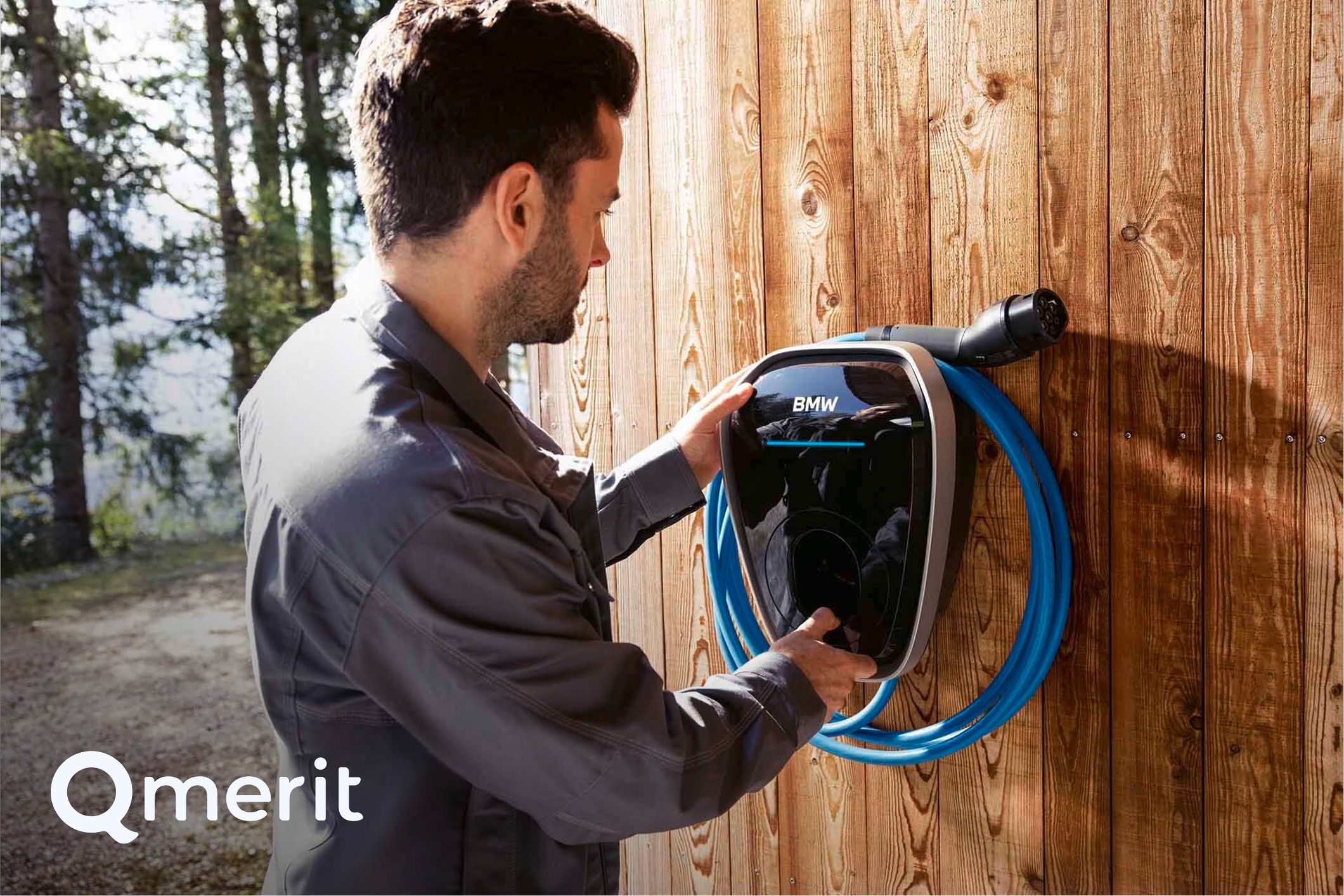 A Qmerit representative installing the BMW Wallbox