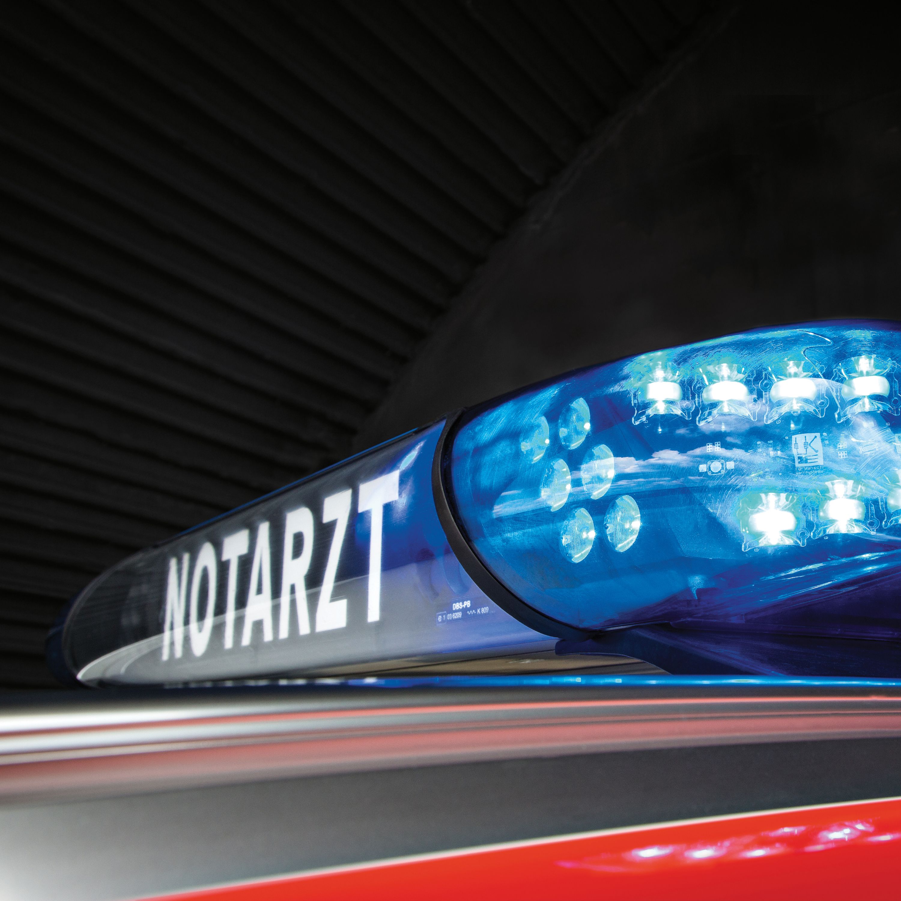 The lit-up signal system of a BMW emergency medical vehicle is shown in detail