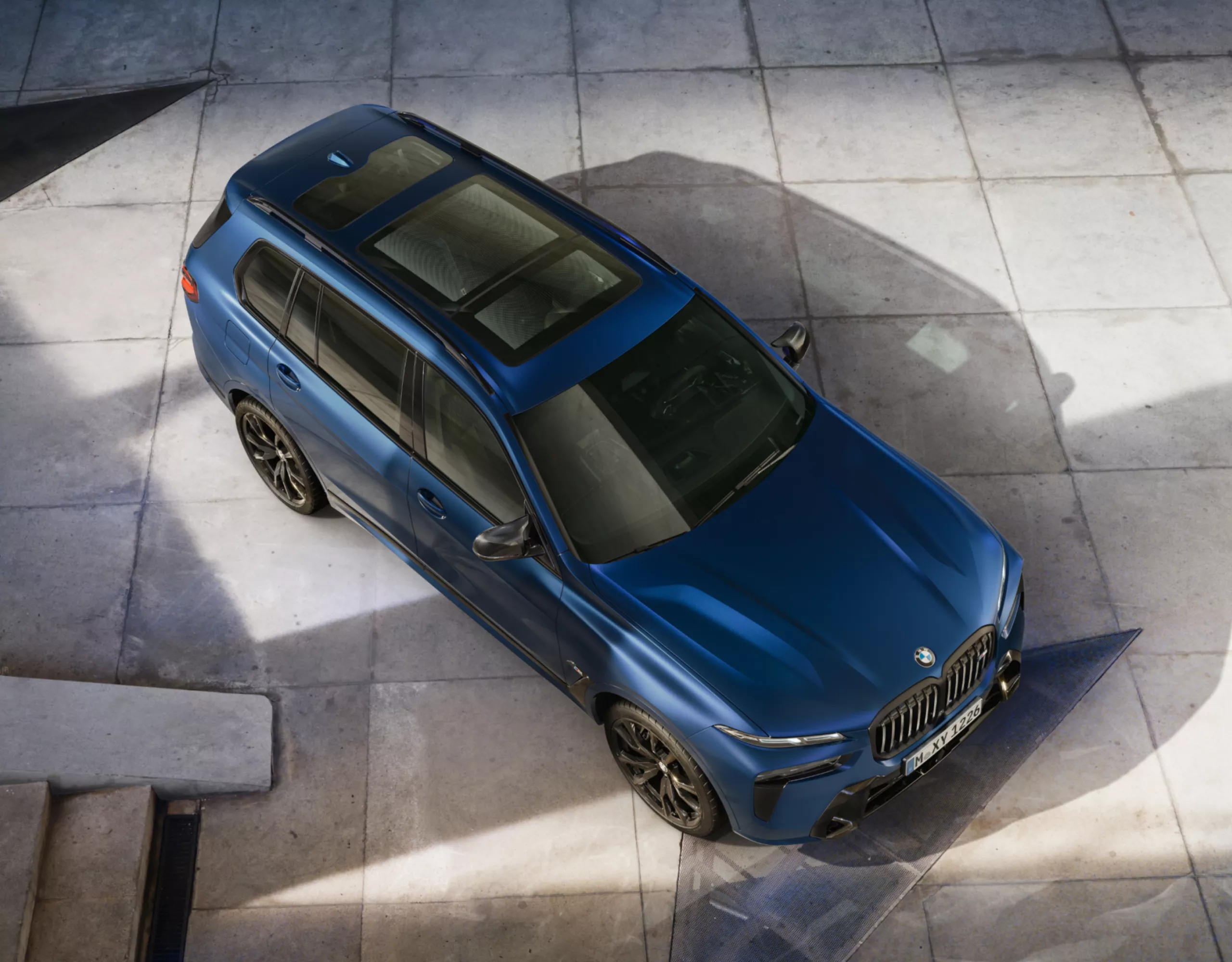 BMW parked on a concrete surface