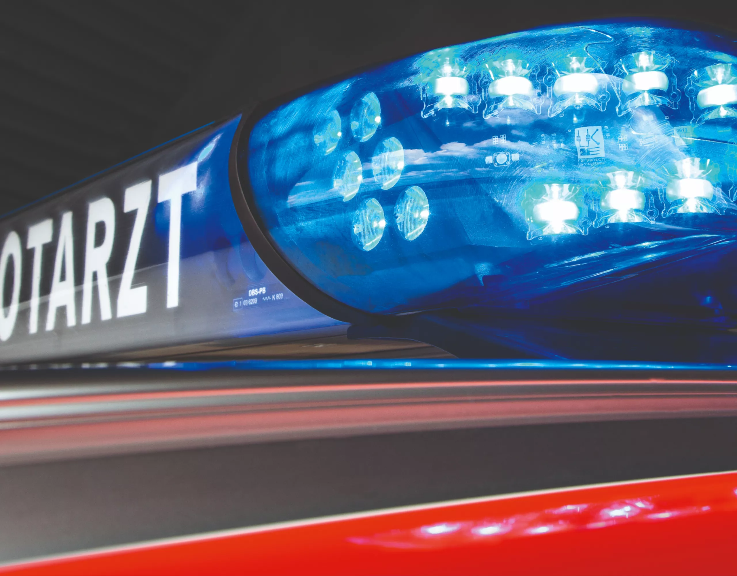 The lit-up signal system of a BMW emergency medical vehicle is shown in detail