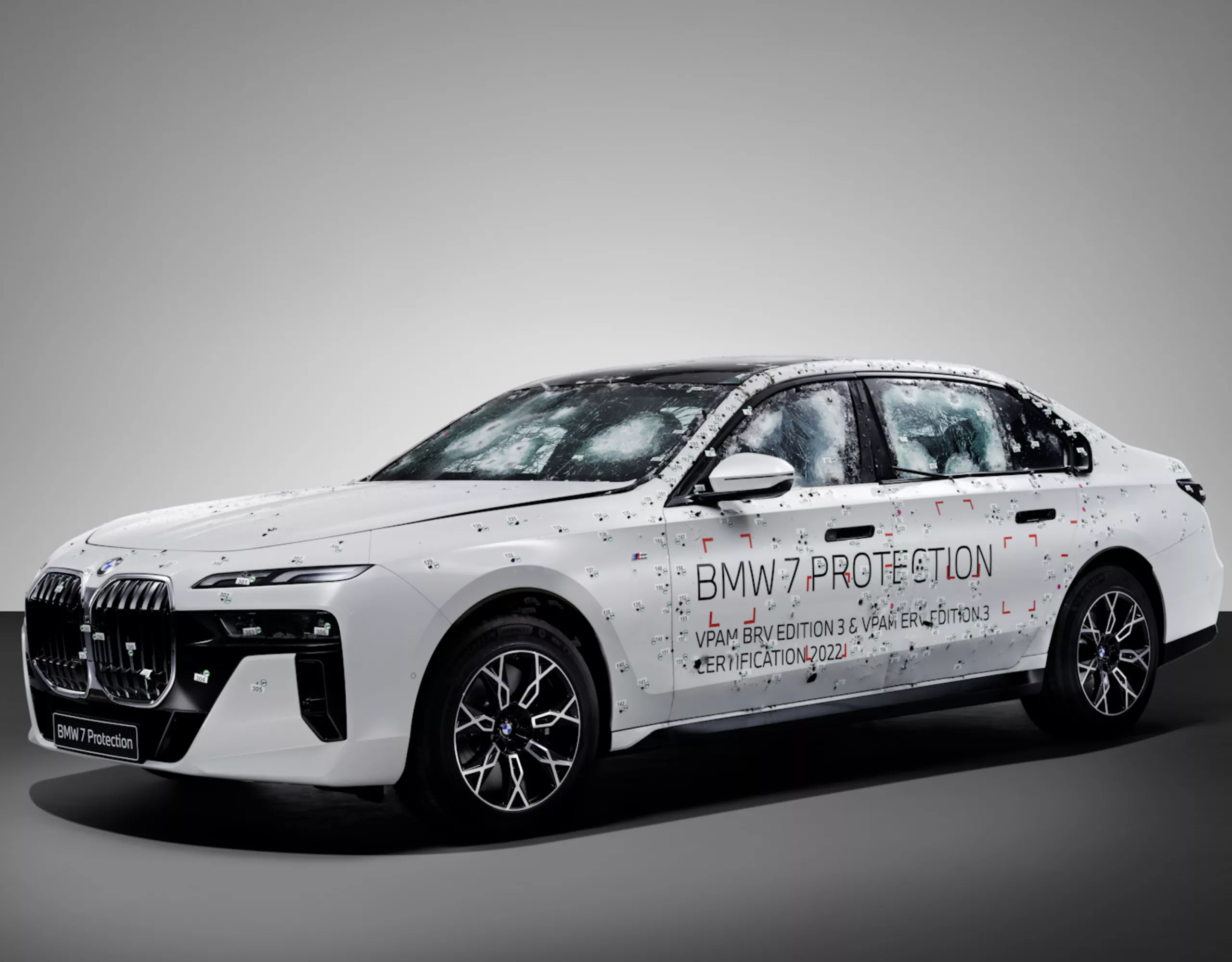 A BMW Protection Vehicle with bullet holes after a ballistic test