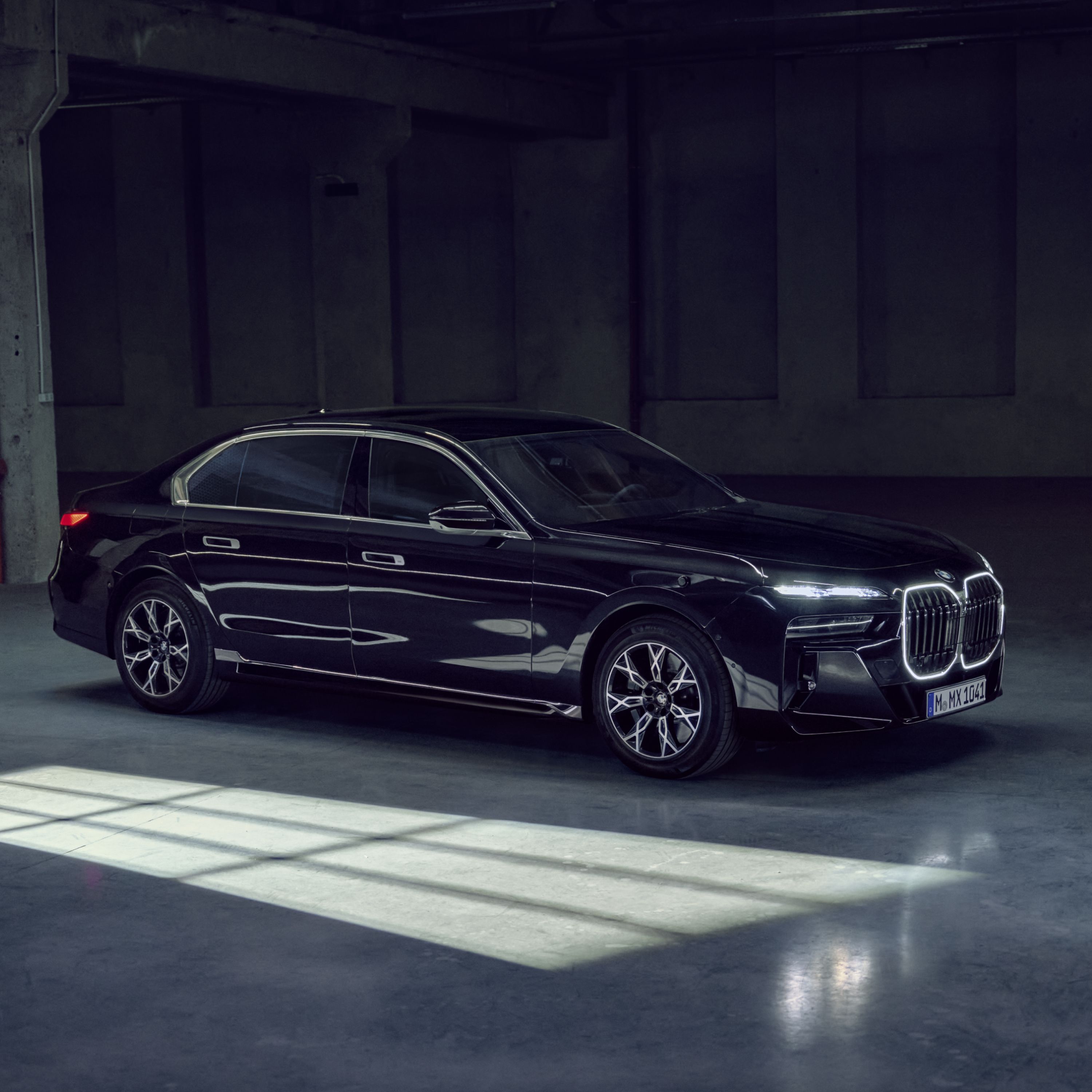 Side view of a BMW Protection Vehicle against a dark background