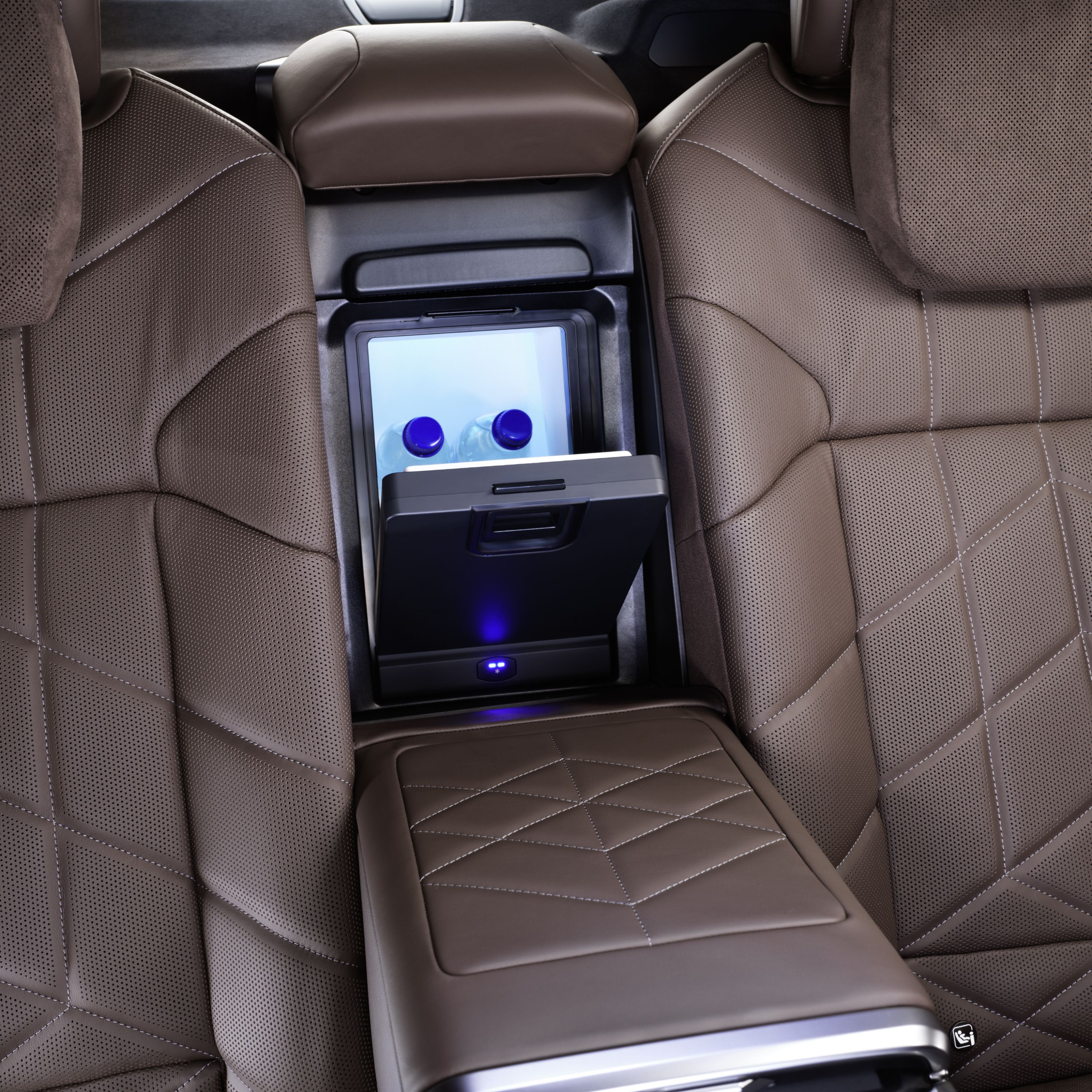 BMW inside view of the rear row of seats with close-up of the cool box between the rear seats