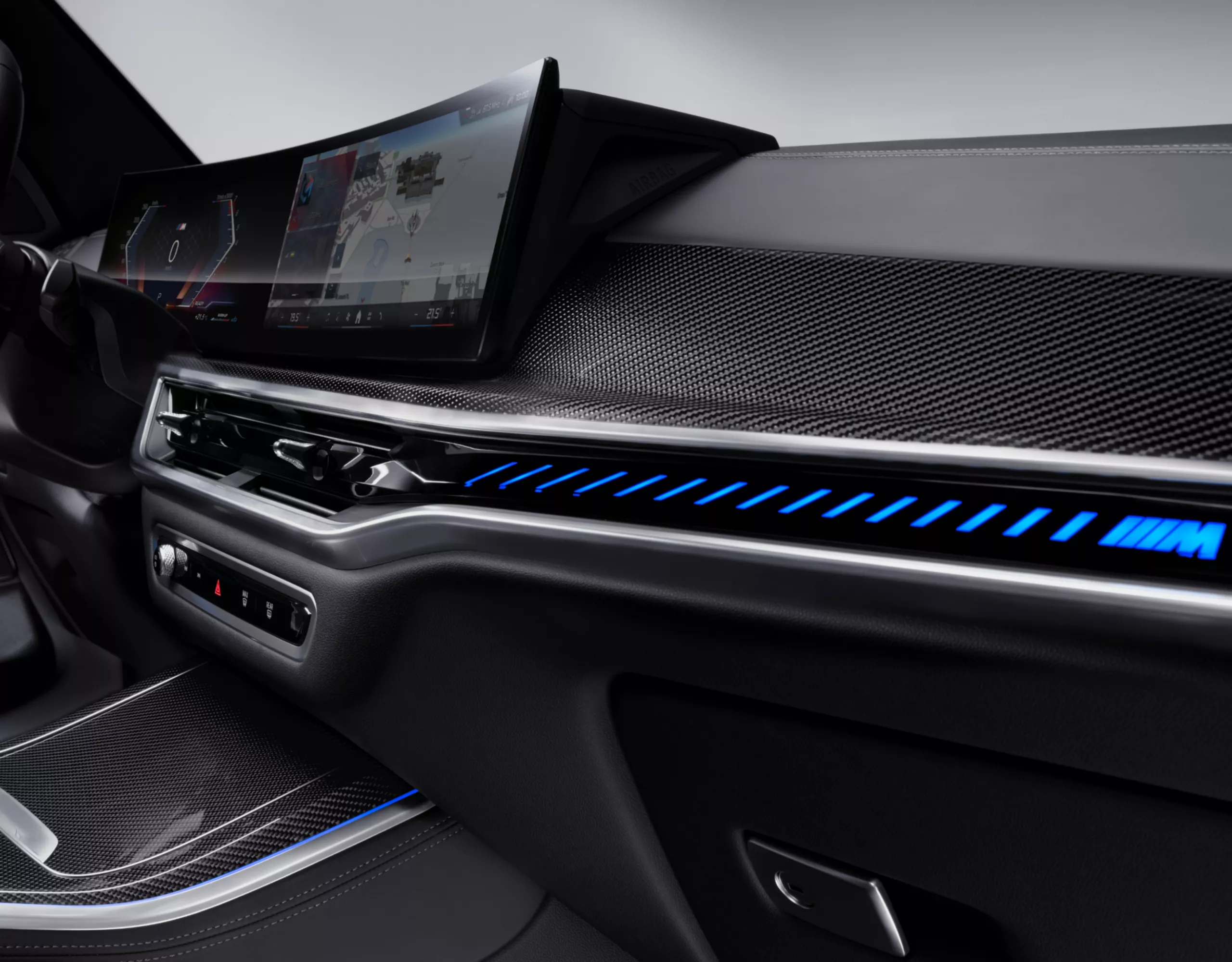 Interior trim with blue backlighting in a BMW cockpit