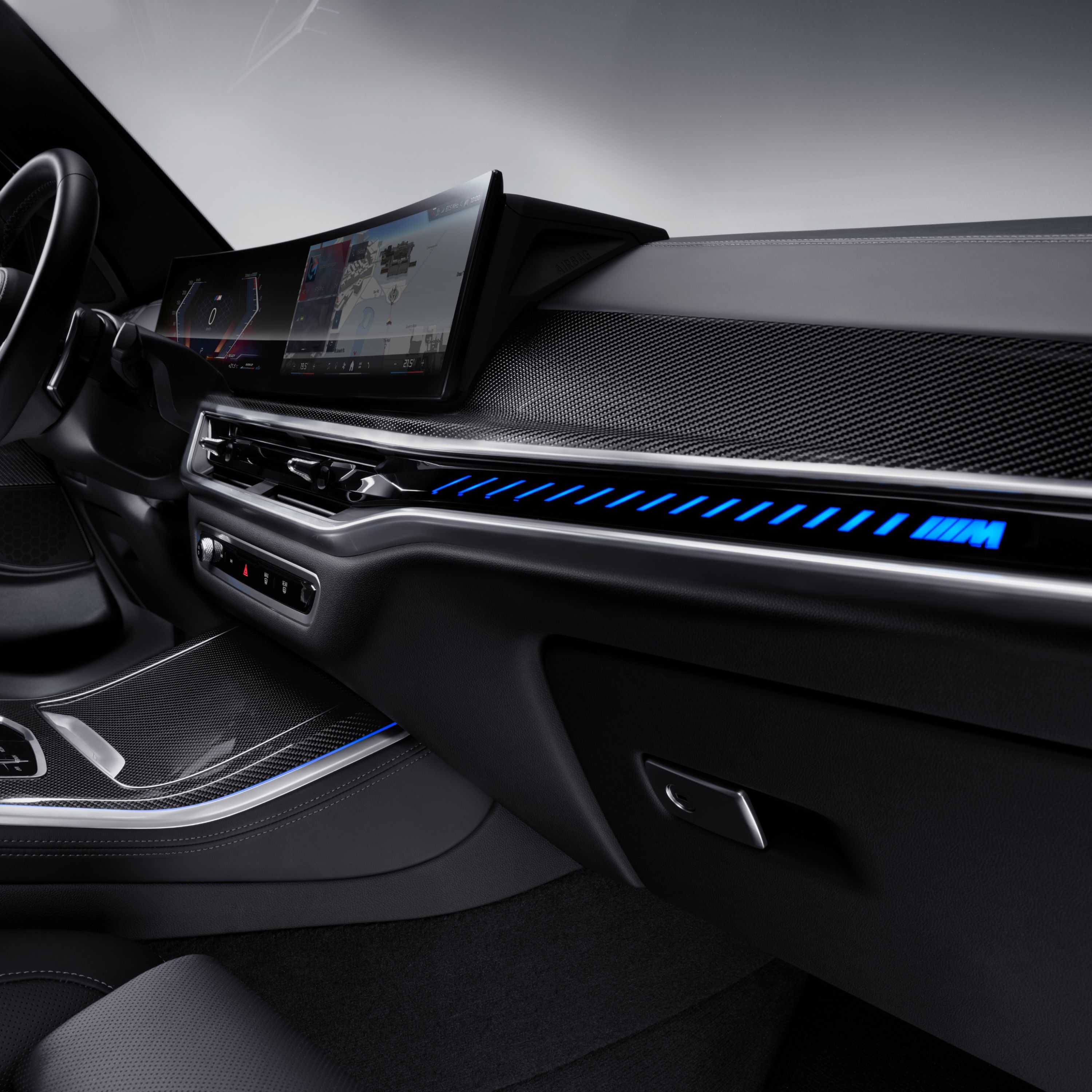 Interior trim with blue backlighting in a BMW cockpit