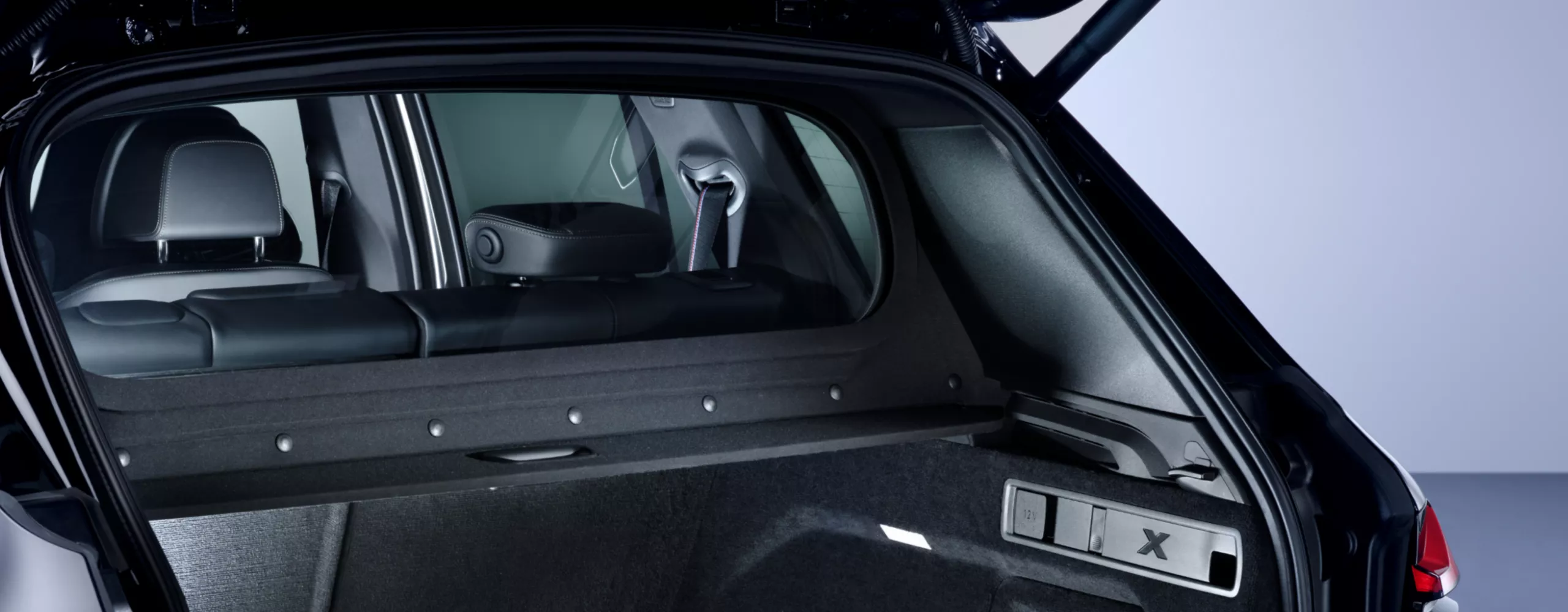 Close-up of the open tailgate of a BMW Protection Vehicle with a view into the passenger cell