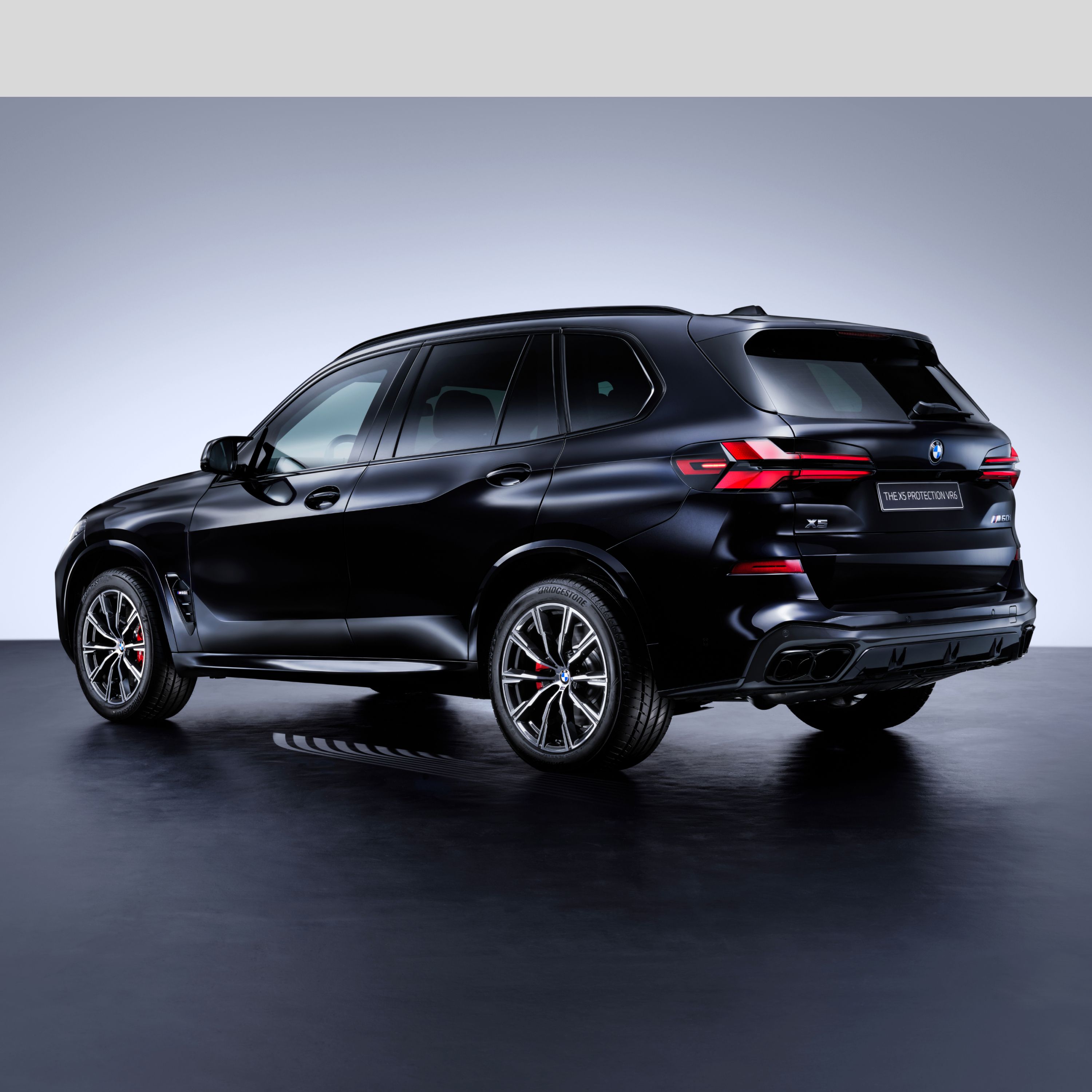 A BMW SUV Protection Vehicle with three-quarters of the side seen from the rear