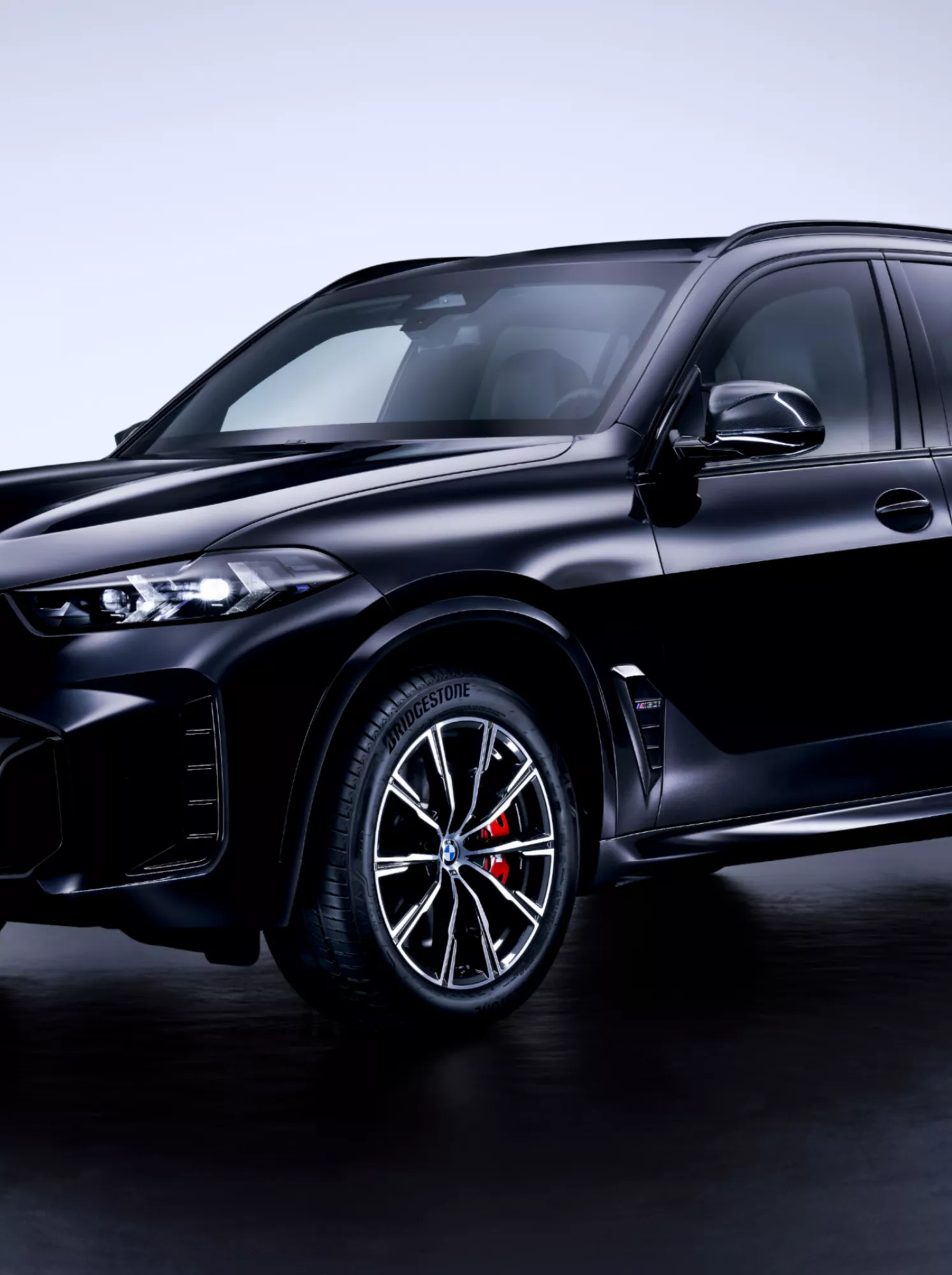 A BMW SUV Protection Vehicle with three-quarters of the side seen from the front