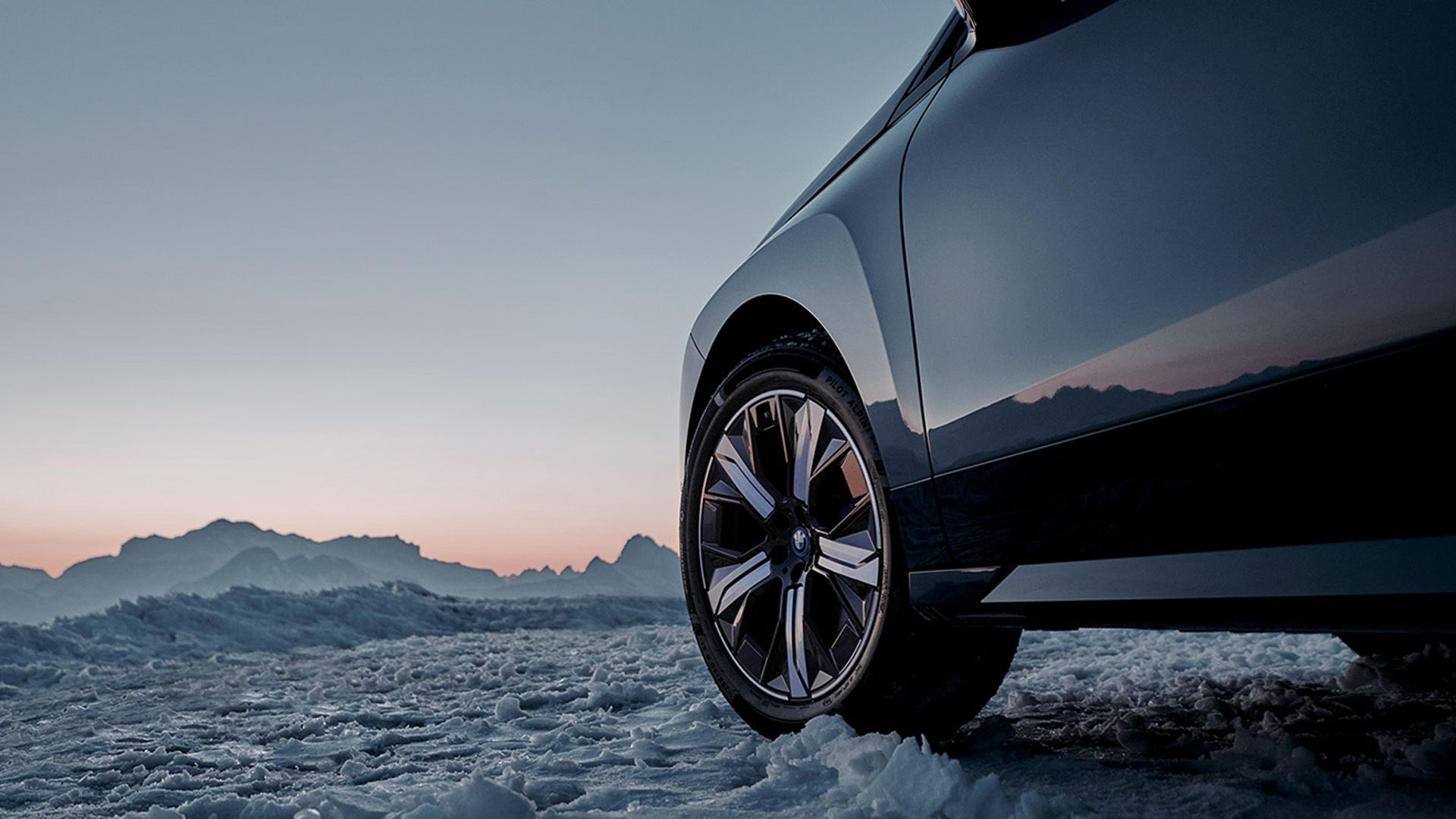 Original BMW Wheels on the BMW i4 (G26 BEV) on wet street