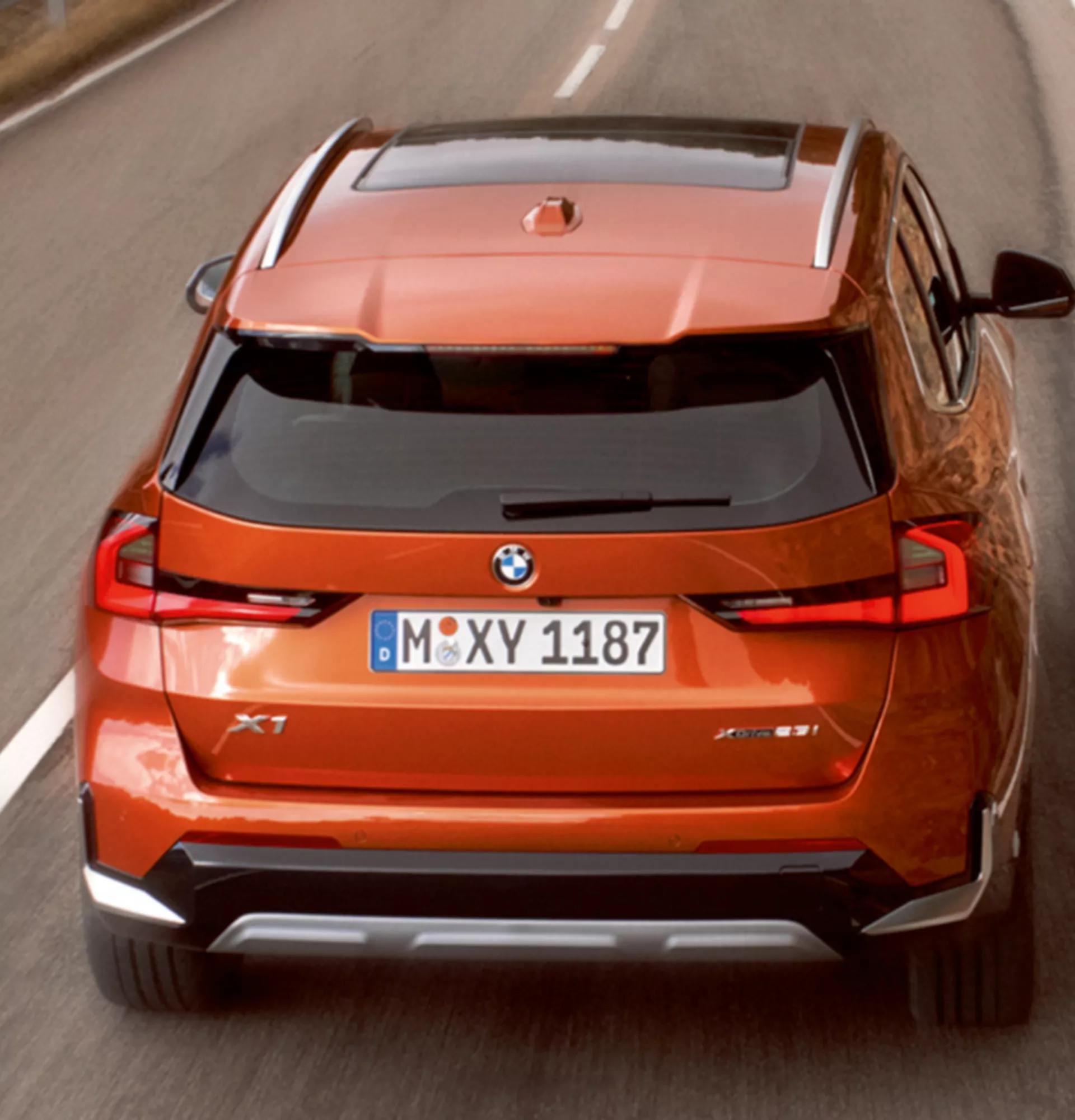 BMW X1 orange rear view 